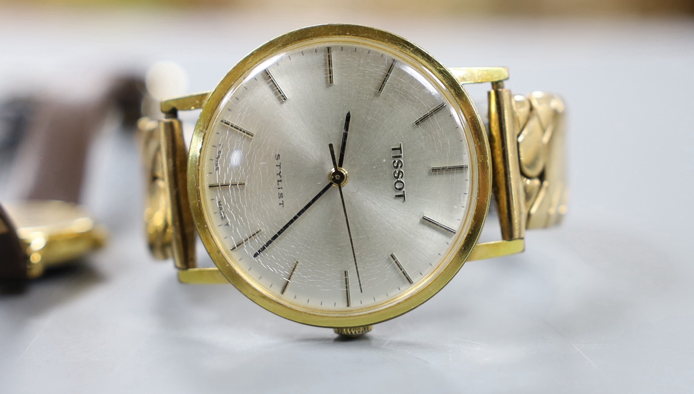 A lady's yellow metal Omega manual wind wrist watch and a group of assorted wrist watch including Lorus, Timex etc.
